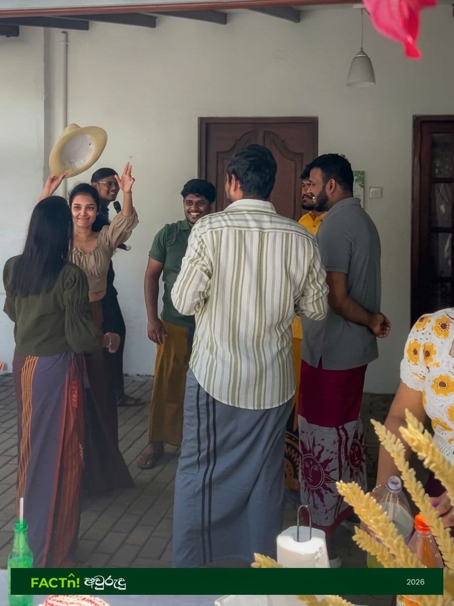 FACTn team members playing a hat game during Avurudu