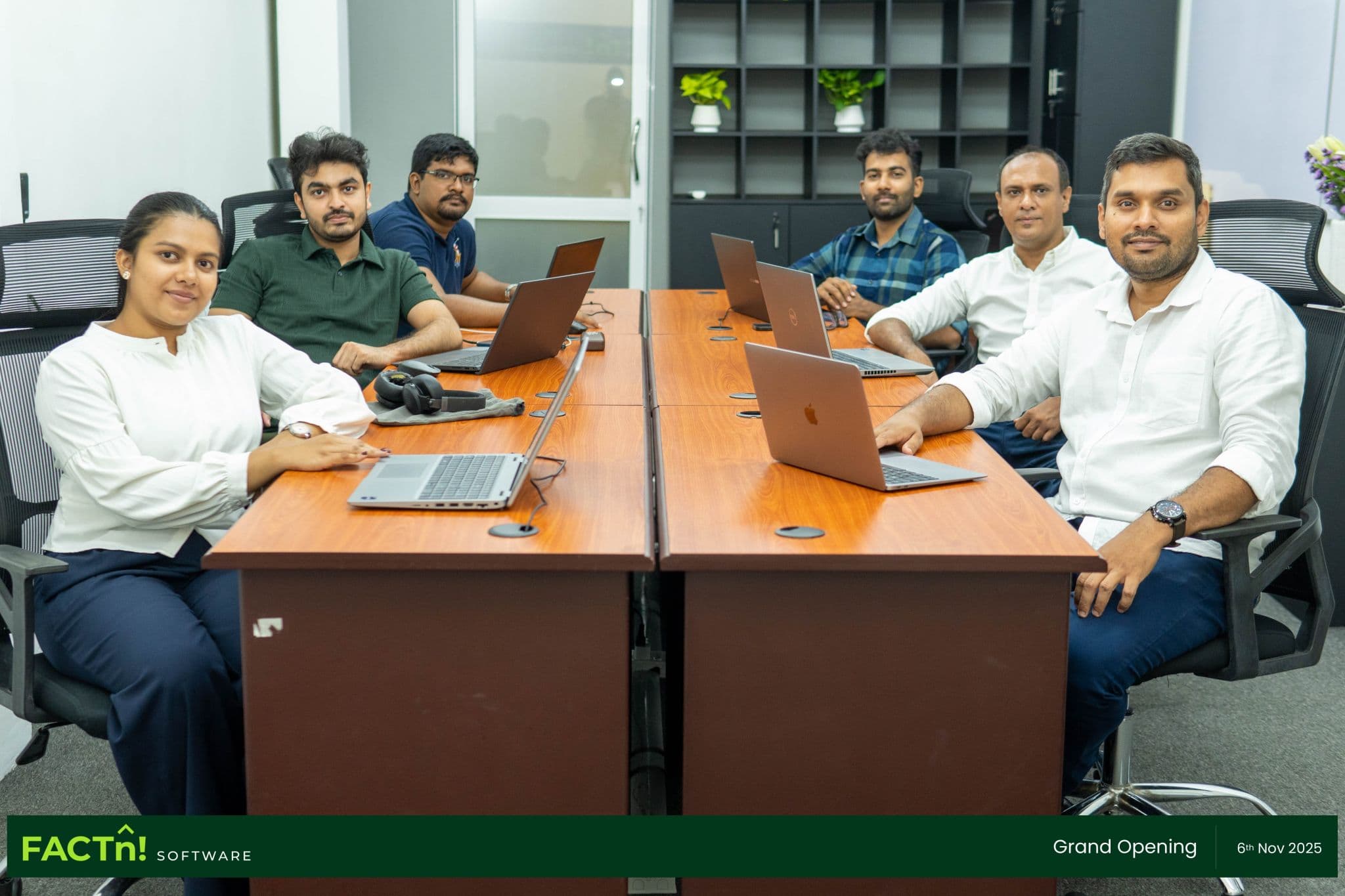 FACTn team sharing a moment during the new office opening