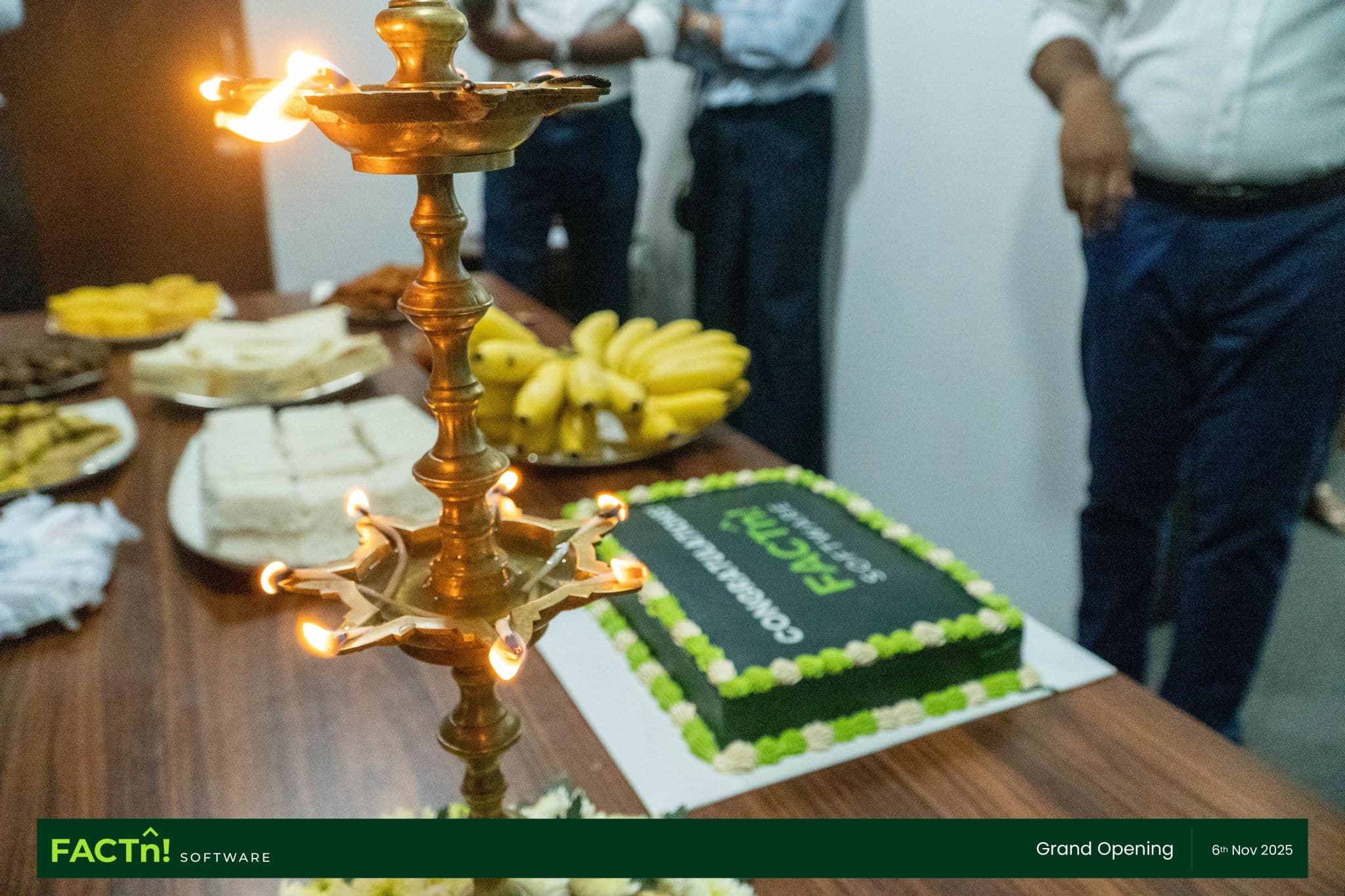 Ceremonial oil lamp and cake at the FACTn new office opening