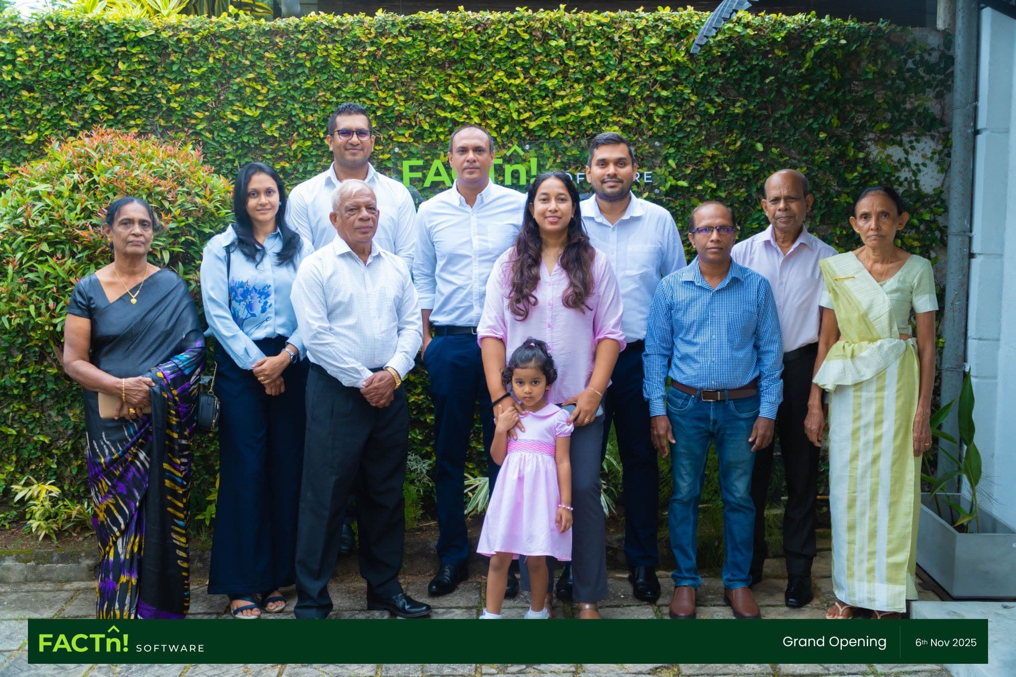 FACTn team and family gathered outside the new office