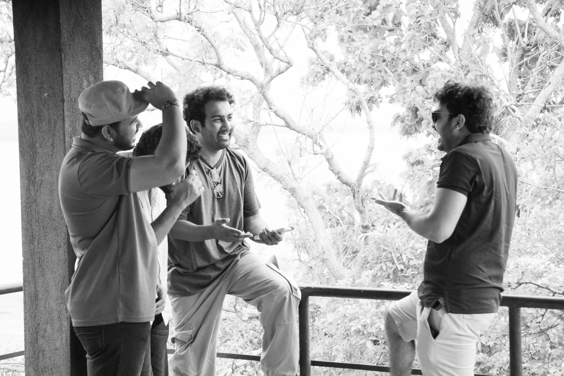 FACTn teammates chatting at a shaded observation platform
