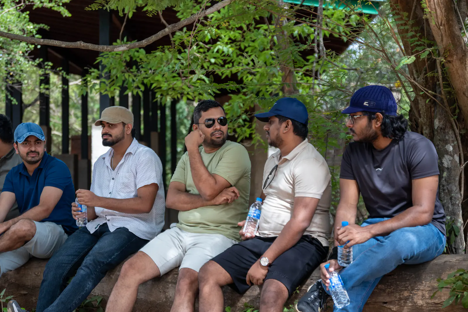 FACTn teammates relaxing together during a stop on the safari
