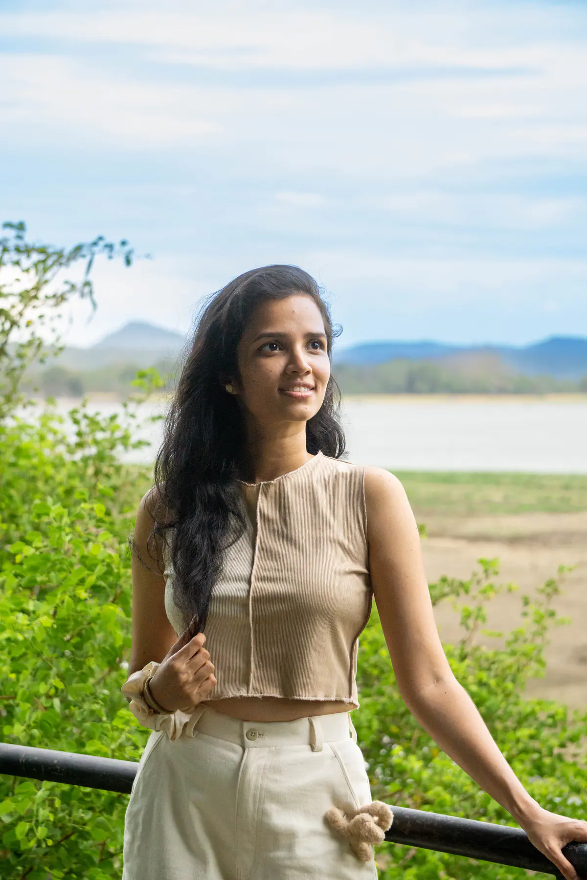 FACTn colleague taking in the Minneriya landscape from an observation platform