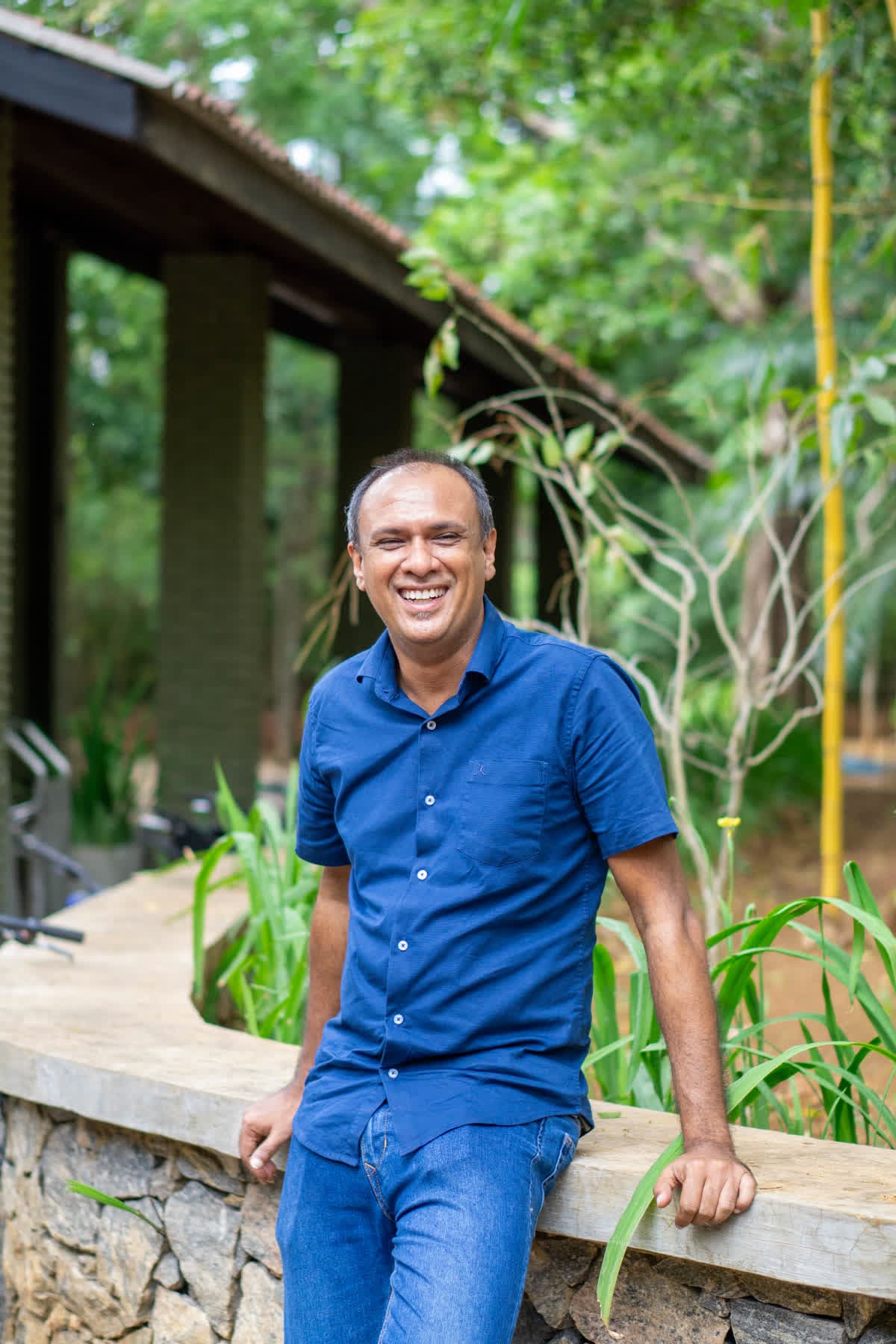 FACTn colleague walking through the Hotel Sigiriya gardens