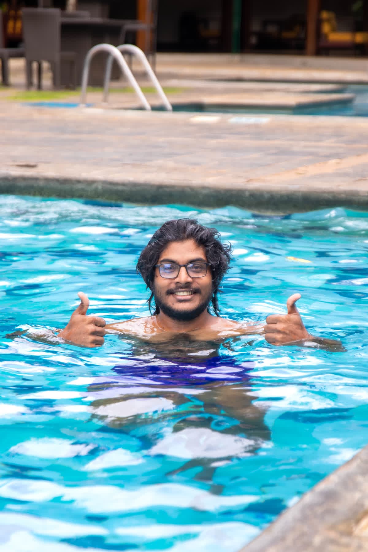 FACTn colleague swimming during the company trip to Sigiriya
