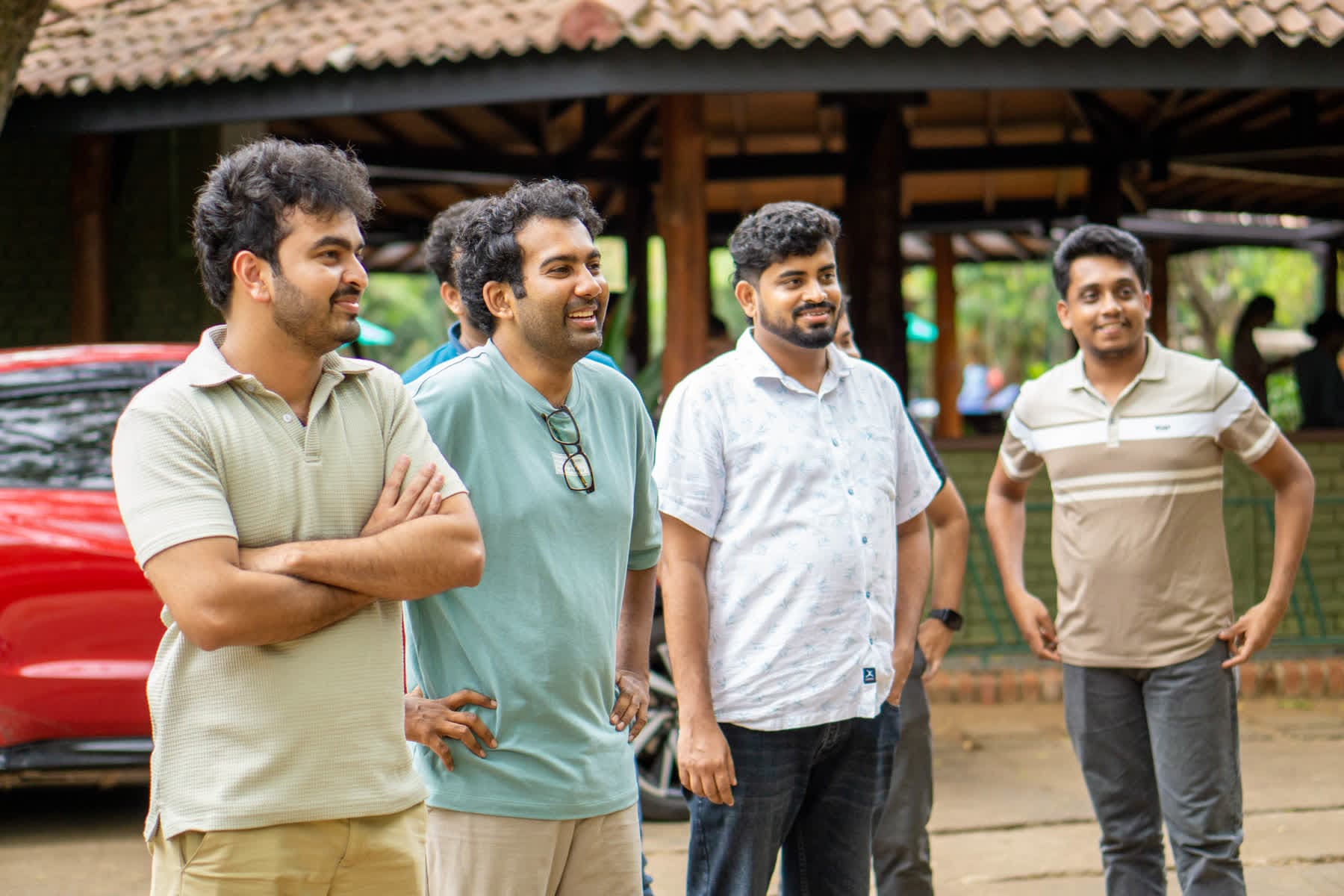 Four FACTn colleagues sharing a laugh in the Hotel Sigiriya gardens
