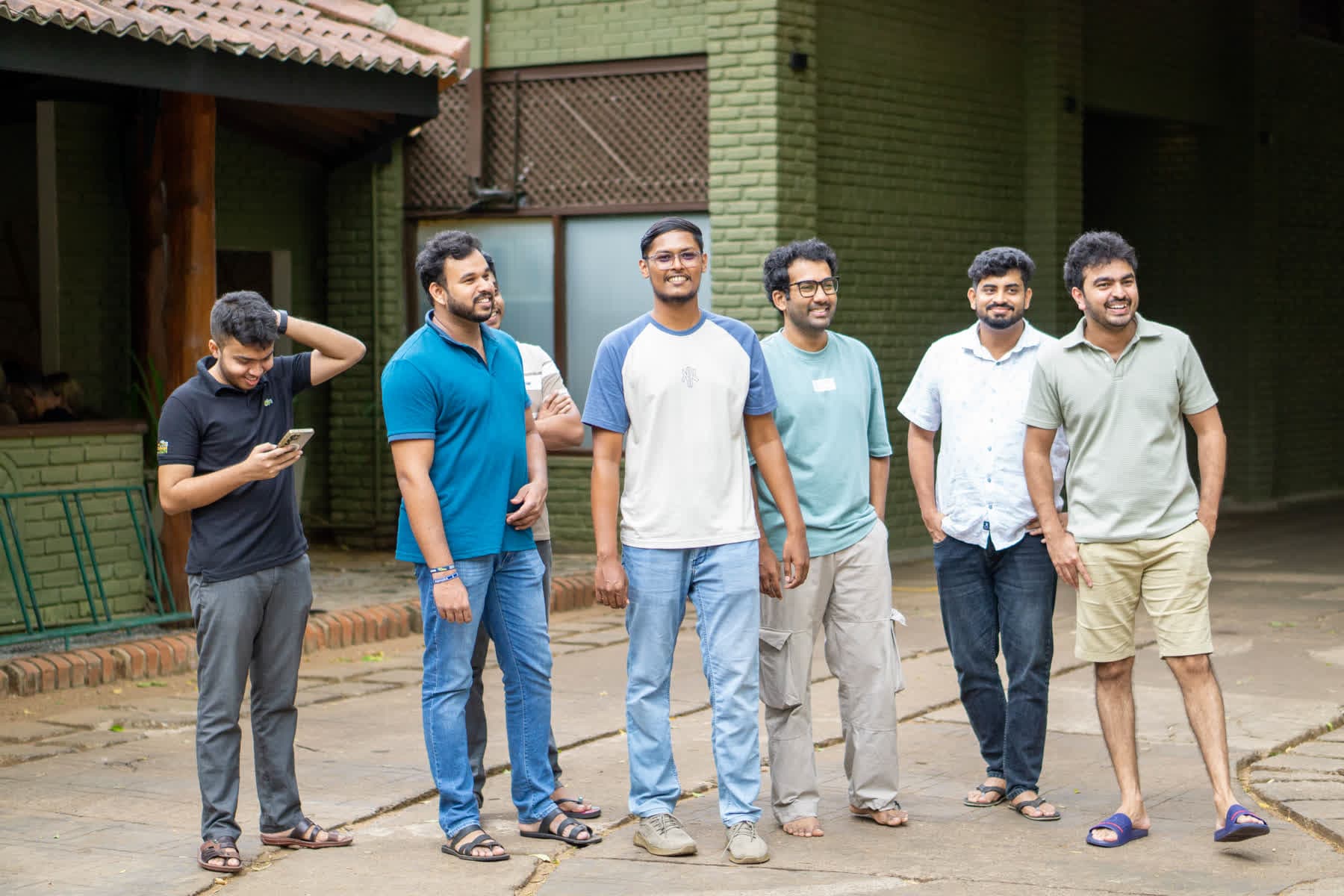 Six FACTn colleagues posing together in the Hotel Sigiriya grounds