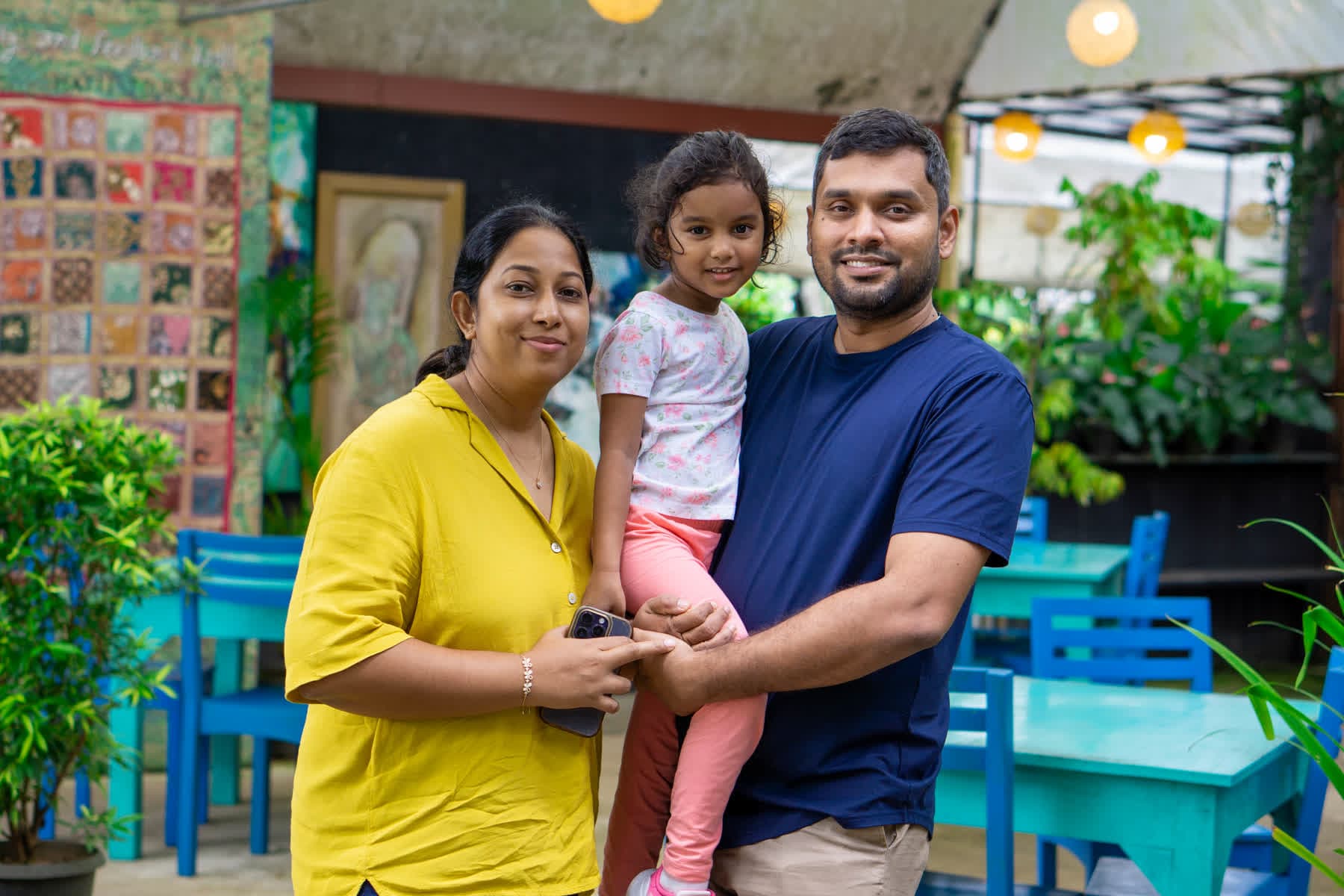 A family with their child enjoying the FACTn trip at Hotel Sigiriya