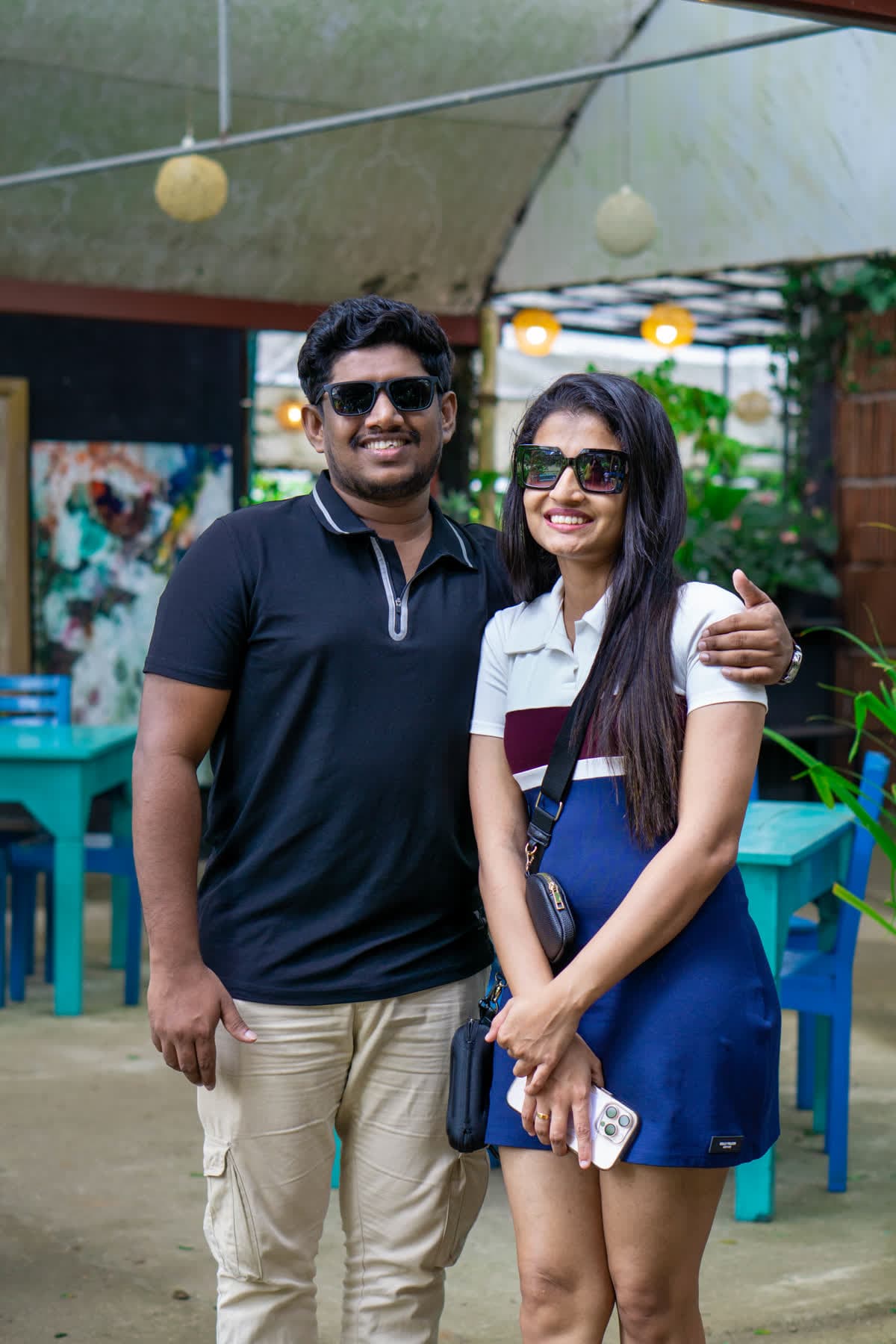 Two guests posing together in the Hotel Sigiriya gardens